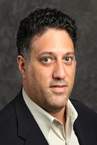 A headshot of David Newman