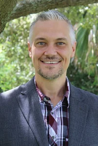 A headshot of Robert Dvorak